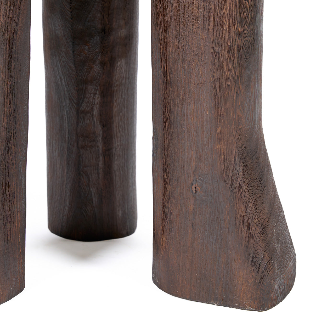 Close-up of legs of a side table on a white background