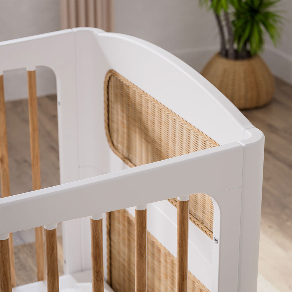 NEREIDES LIT Bed 70X140 - Neige with wooden sides in a room with a plant and wooden floor.