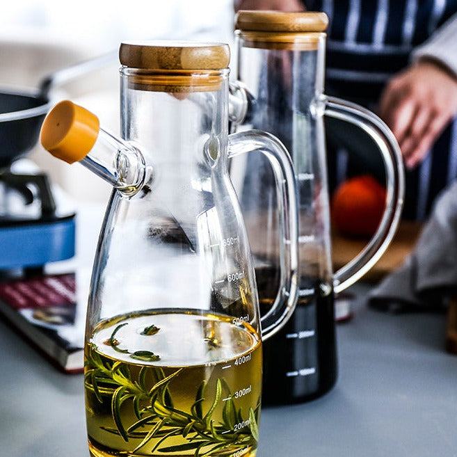 Bouteille d'huile en verre transparent avec poignée