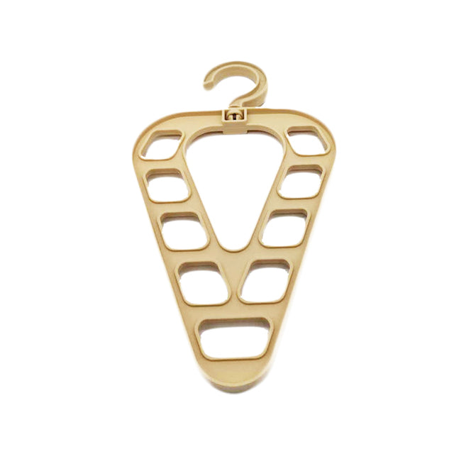 Cintre magique à neuf trous