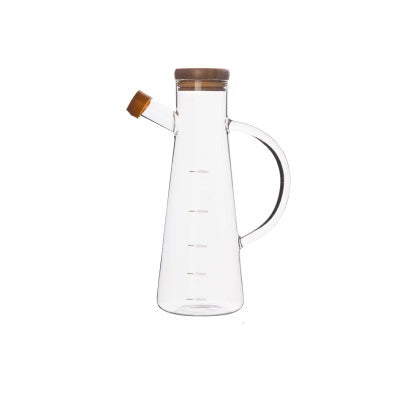 Bouteille d'huile en verre transparent avec poignée