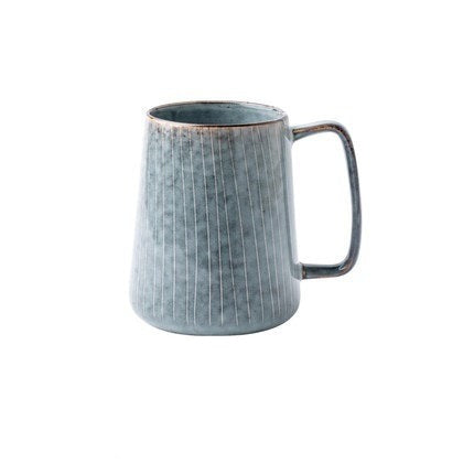 Tasse rétro en céramique avec motifs à rayures