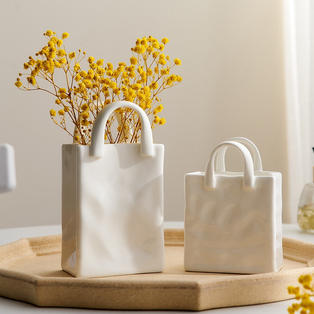 Vase à fleurs nordique portable en céramique blanche pour la décoration intérieure