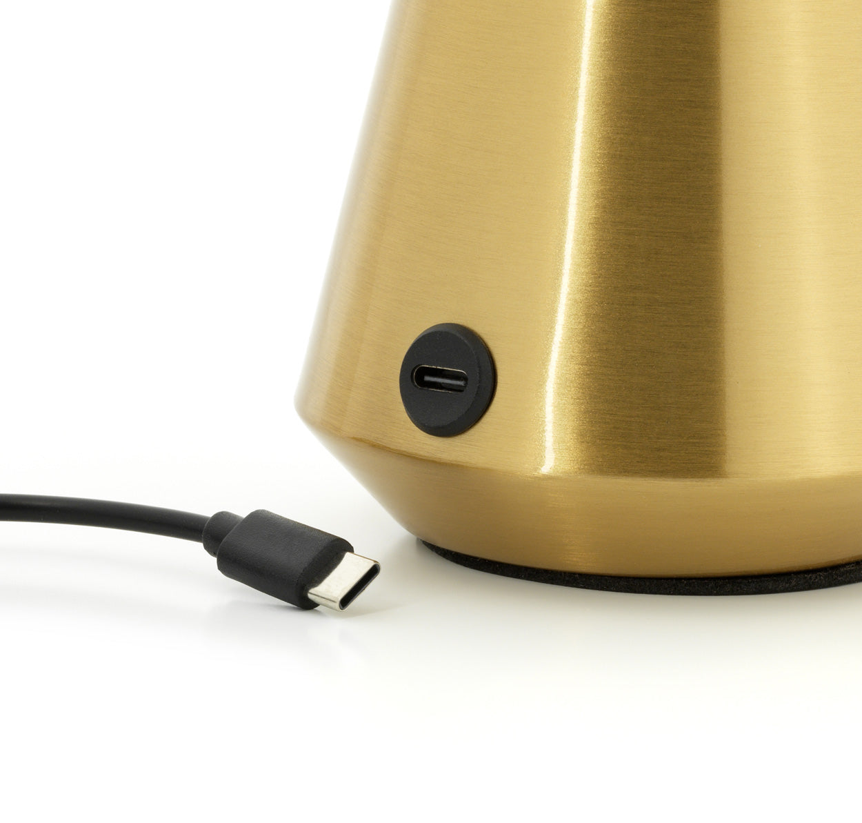 Gold table lamp with USB Type-C cable on a white background