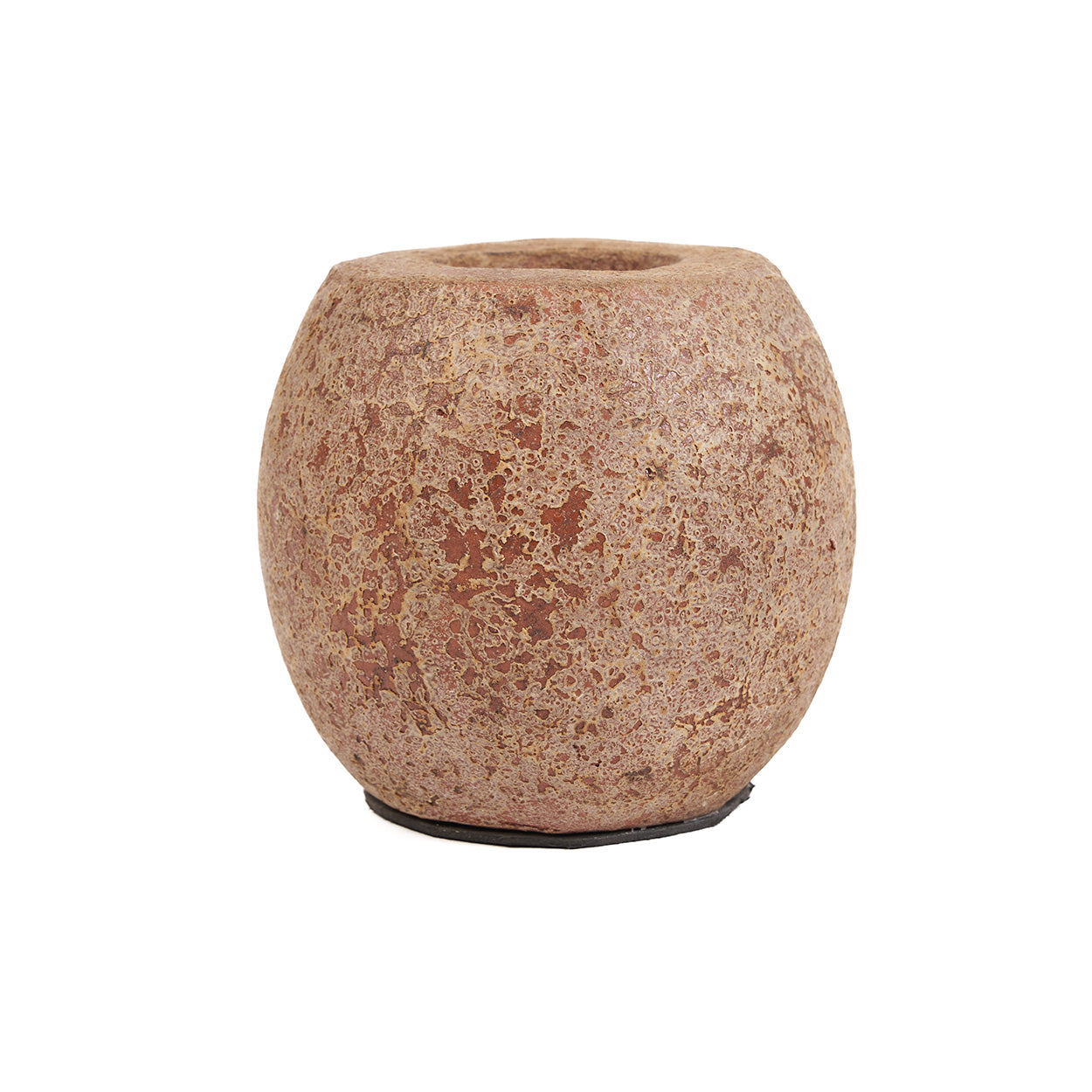 Round terracotta candle holder on a white background