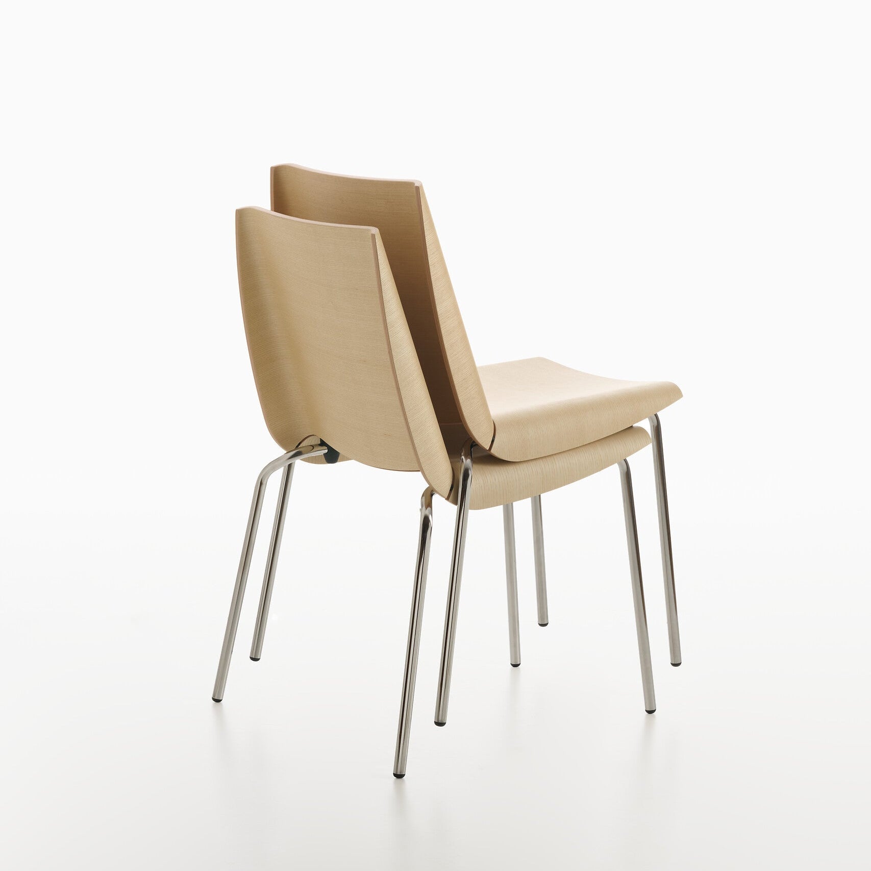 Two beige MILLEFOGLIE chairs with metal legs on a white background