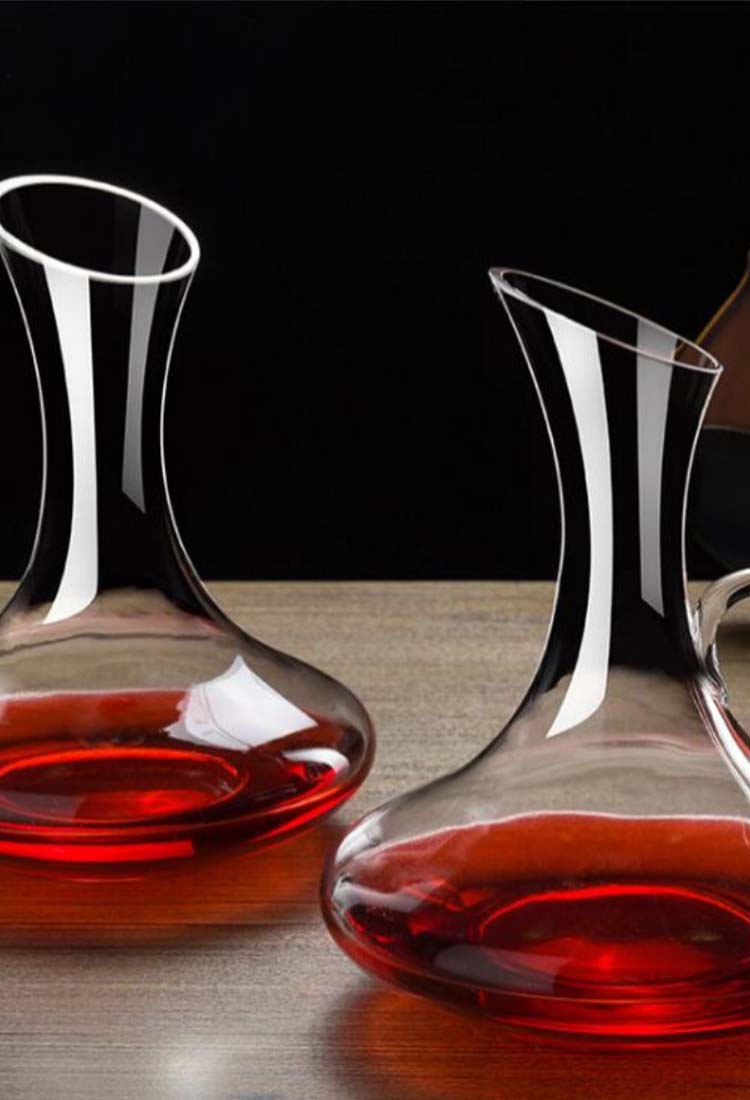 Handmade glassware with thin neck and wine inside