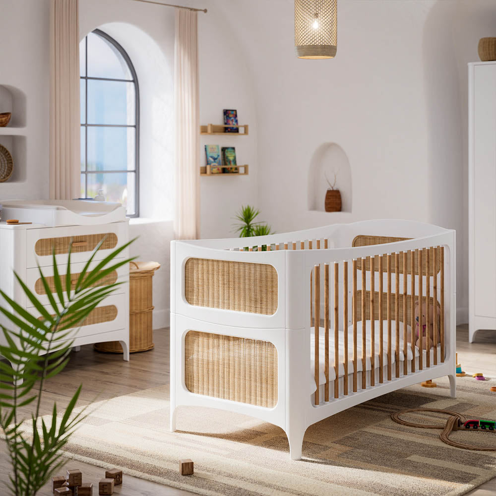 Nursery room with a NEREIDES LIT Bed 70X140 - Neige and wooden accents, featuring a large window and decorative elements.