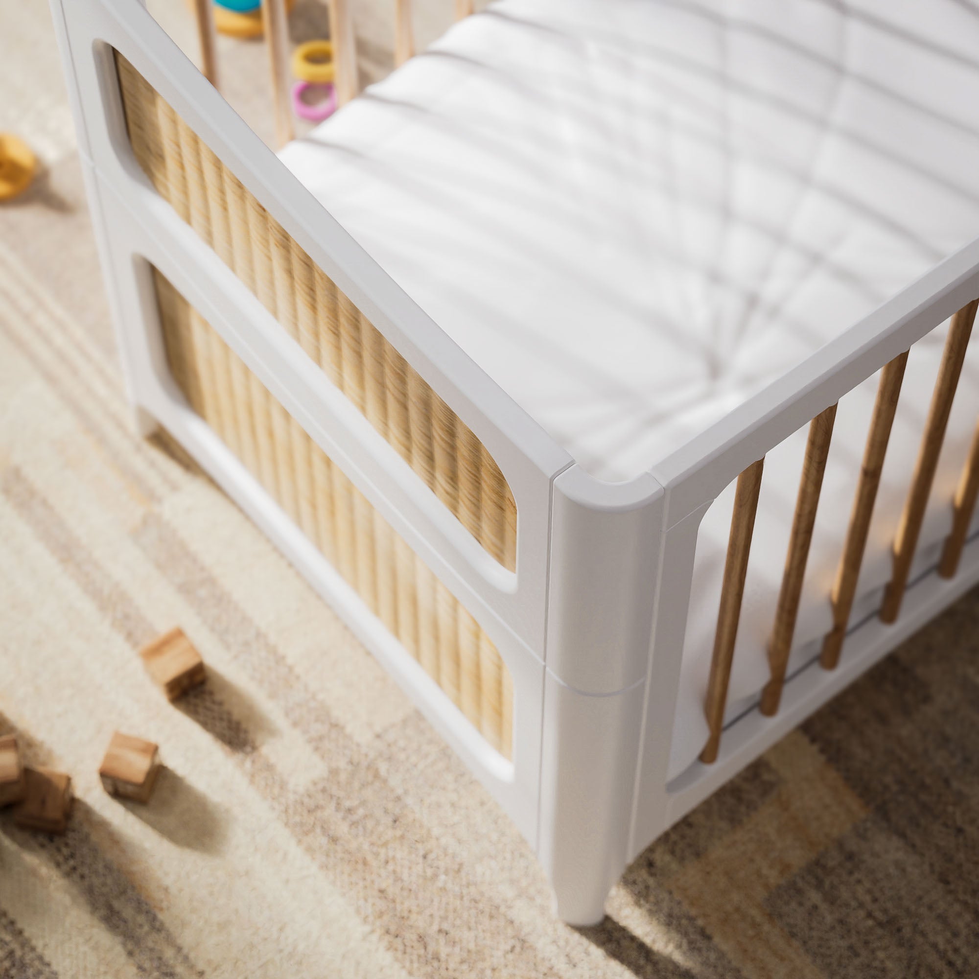 NEREIDES LIT Bed 70X140 - Neige with wooden sides on a carpeted floor with toys around