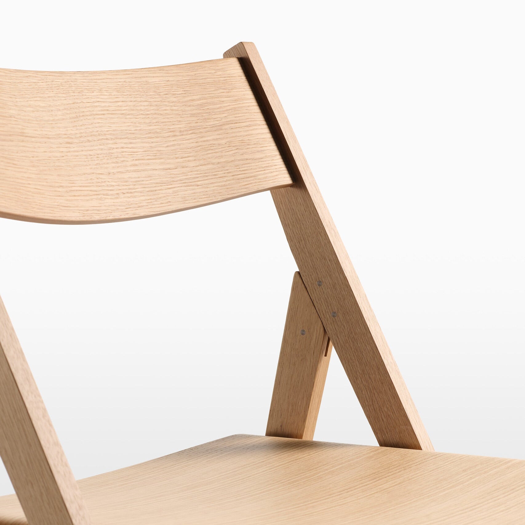 THEO wooden folding chair on a white background