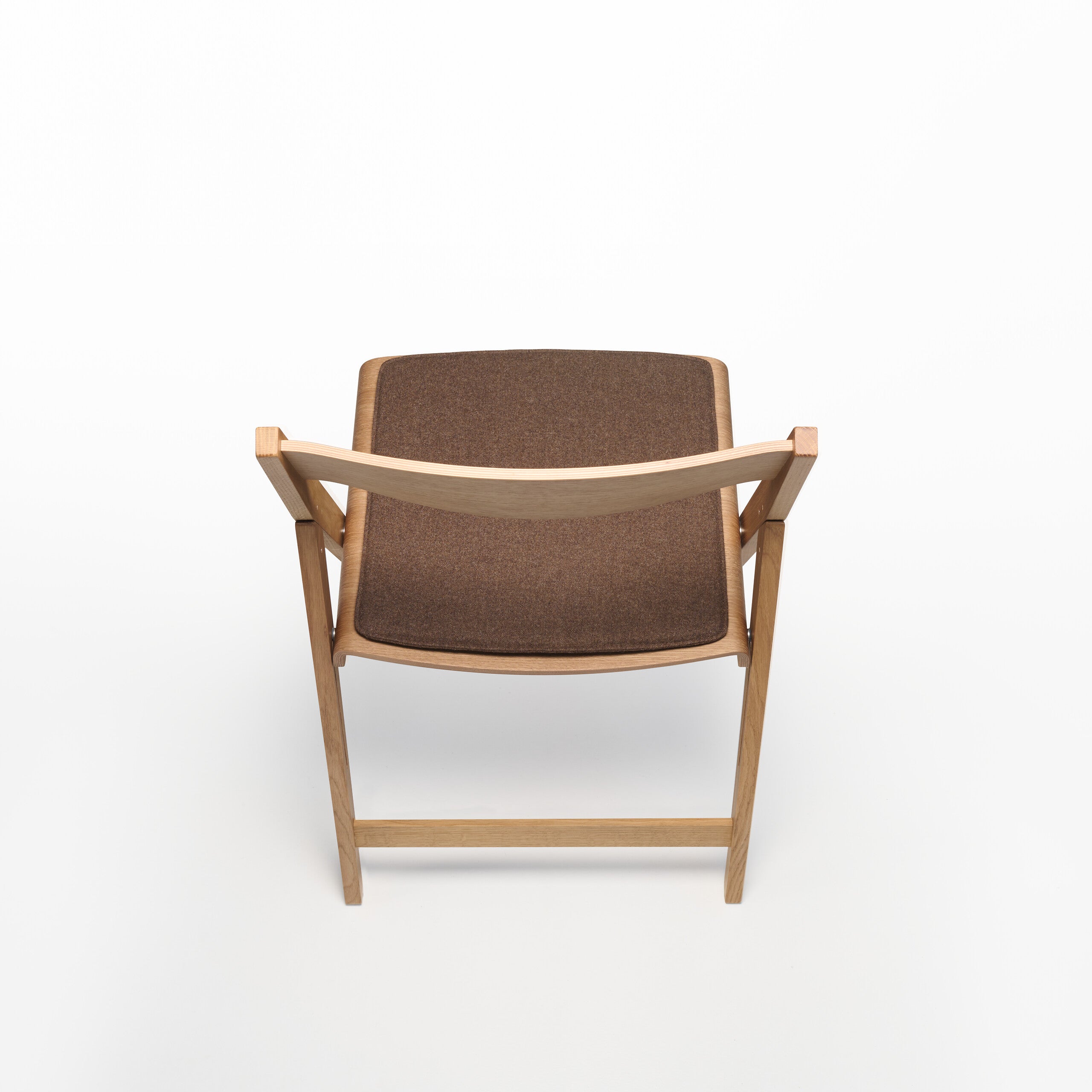 THEO folding chair with cushion and wooden frame on a white background