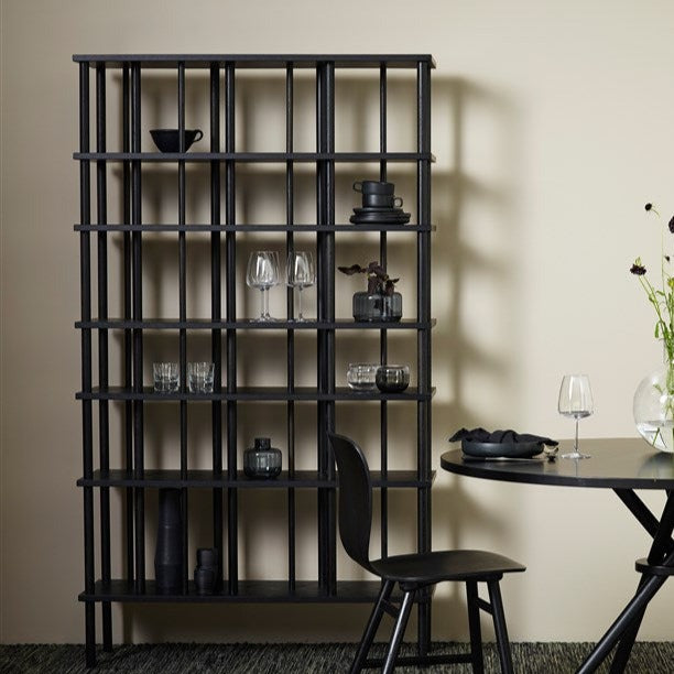 LEVEL Bookshelf LE 756 black 110 cm width interior view with table