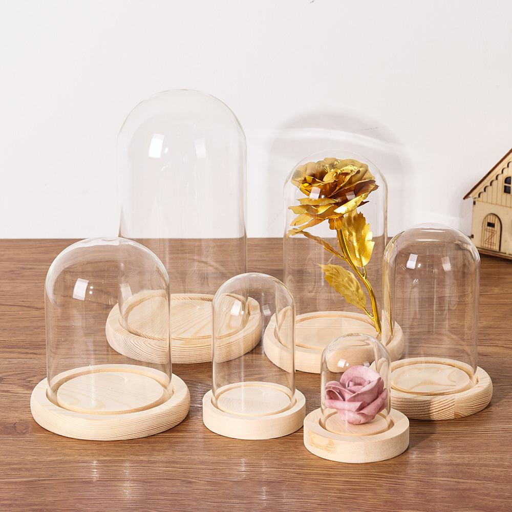 Vase à fleurs en verre avec base en bois