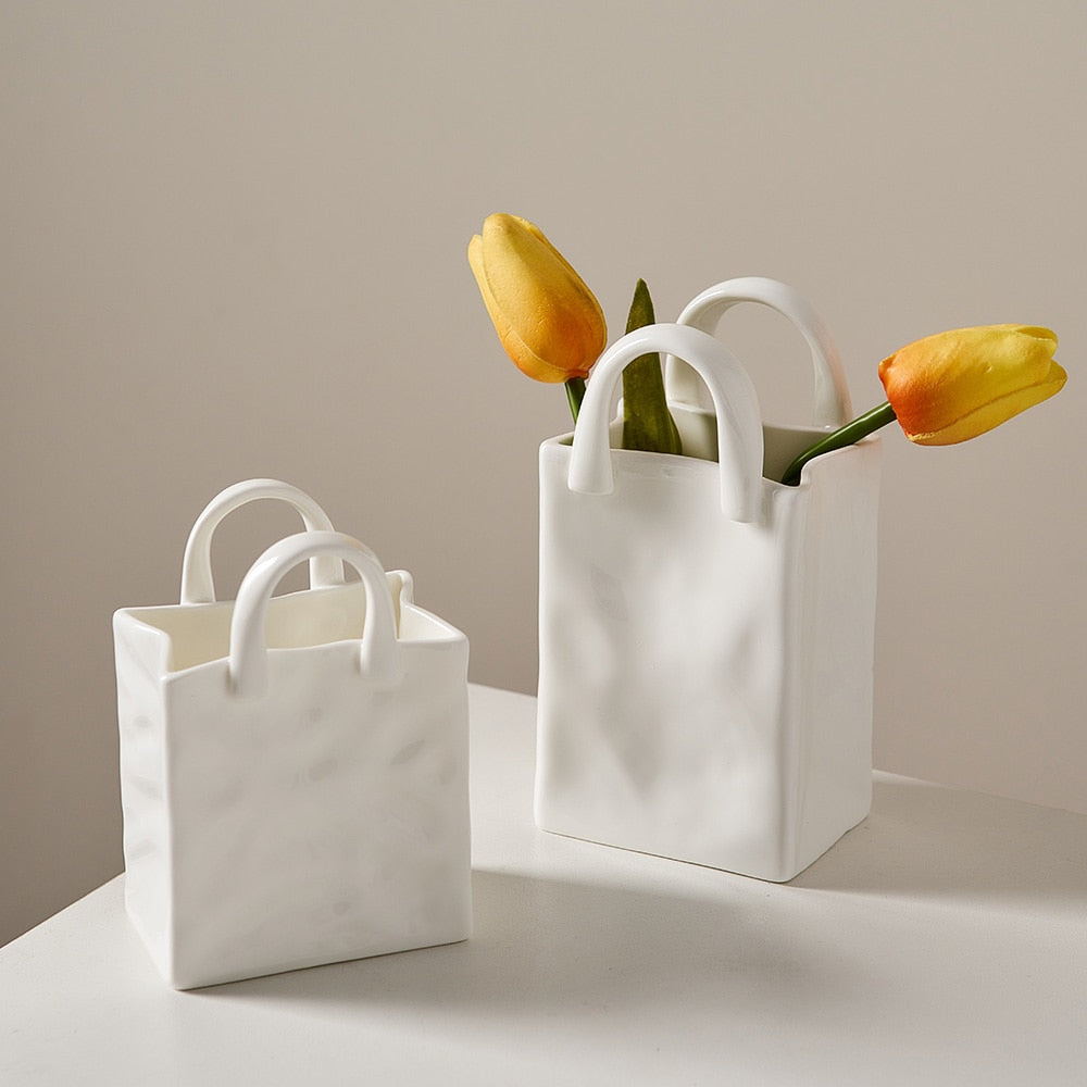 Vase à fleurs nordique portable en céramique blanche pour la décoration intérieure
