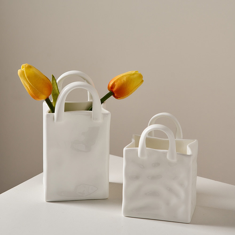Vase à fleurs nordique portable en céramique blanche pour la décoration intérieure
