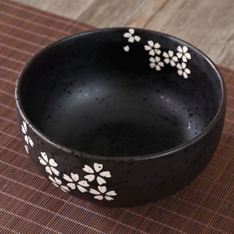 Bol en céramique japonais avec baguette et cuillère